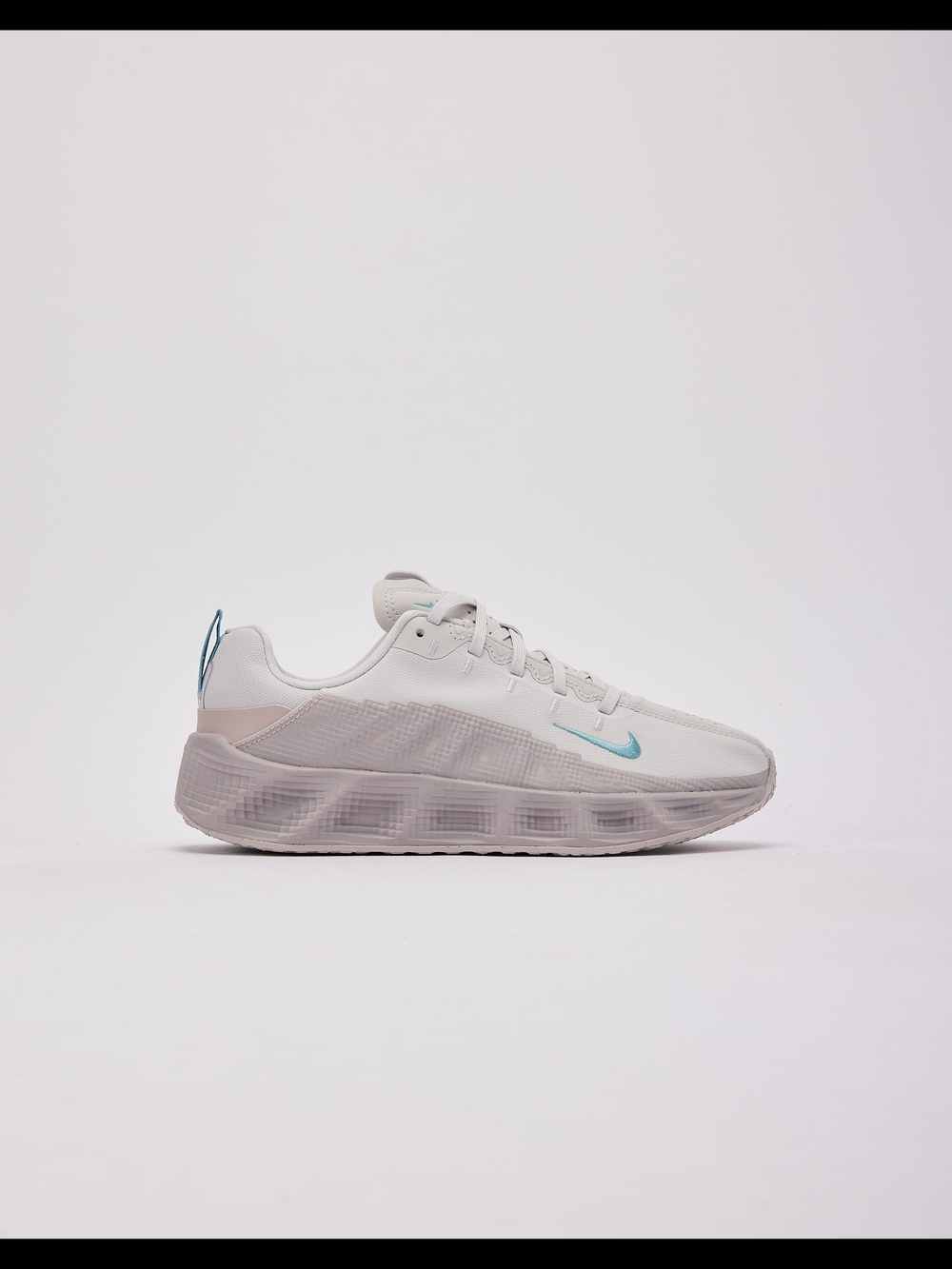 Nike Lightweight Runner Sneakers in White with Teal Swoosh